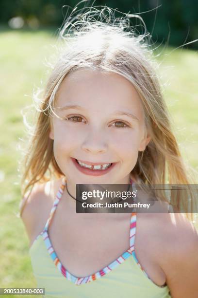 Girl Smiling Portrait High-Res Stock Photo - Getty Images