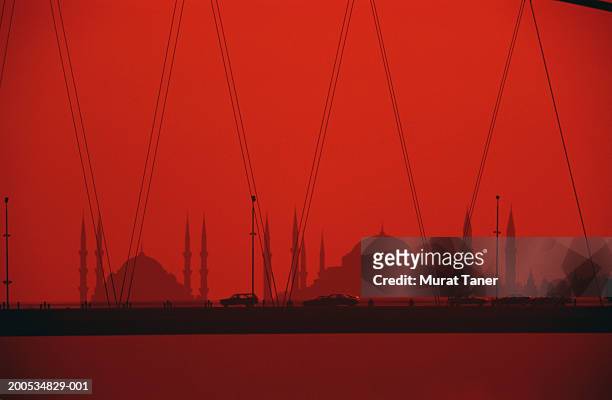 turkey, istanbul, bosphorus suspension bridge, dusk, (red tone) - bosphorus bridge stock-fotos und bilder
