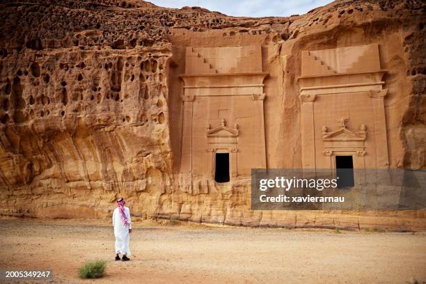 saudi visitor admiring jabal al-ahmar, al-ula - medinah stock pictures, royalty-free photos & images