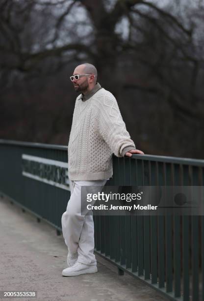 Benjamin Beyer aka David Puentez seen wearing Jacques Marie Mage white milky sunglasses, brown / beige buttoned shirt, By Aylin Koenig beige wool...