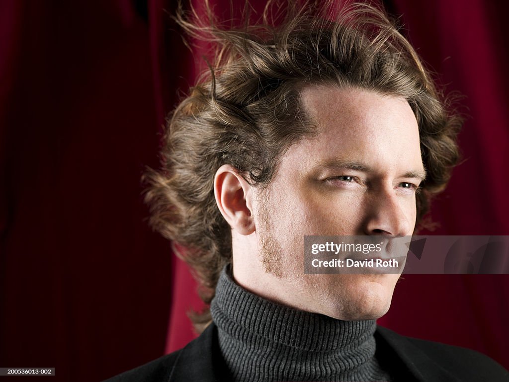 Young Man With Hair Blowing In Wind High-Res Stock Photo - Getty Images