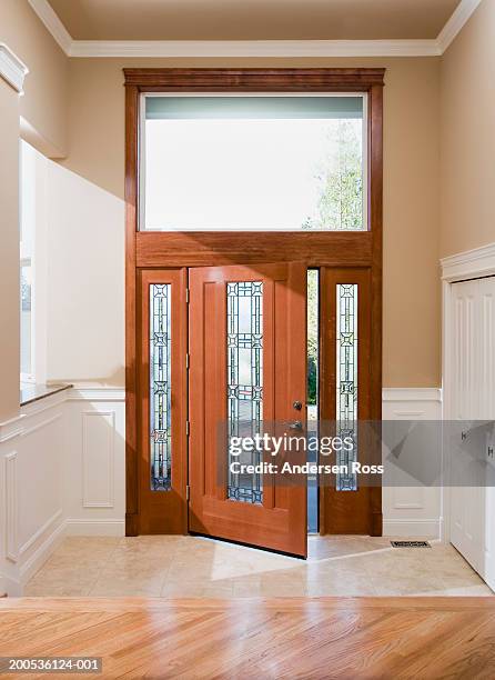 entryway and front doorway in house - stained glass door stock pictures, royalty-free photos & images