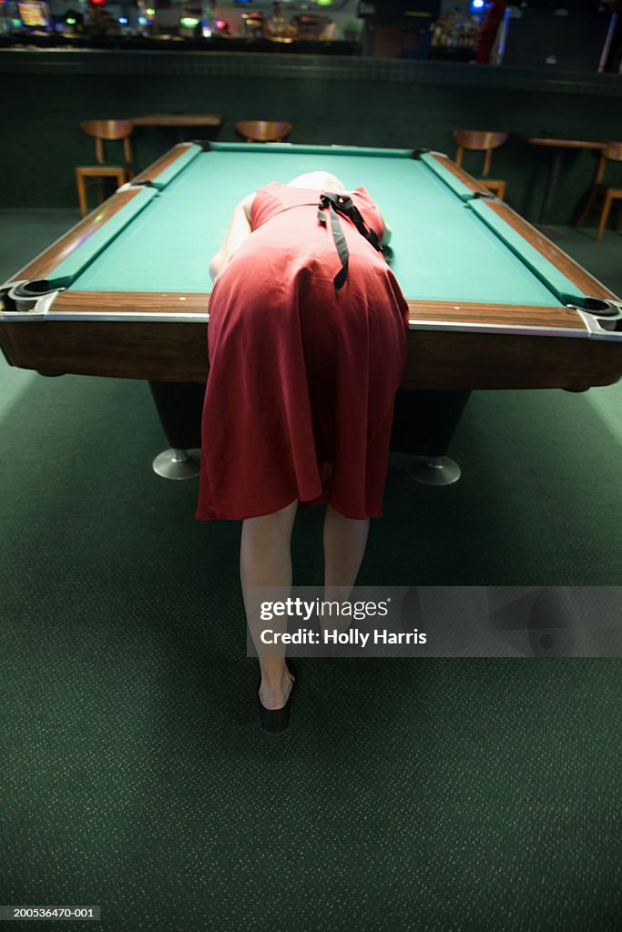 Young Woman Leaning Over Pool Table High-Res Stock Photo - Getty Images