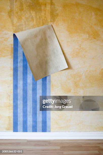 wallpaper peeling off wall - peeling off stock pictures, royalty-free photos & images