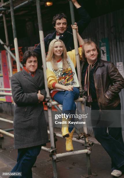 Pamela Stephenson posing with Griff Rhys Jones, Rowan Atkinson and Mel Smith, stars of the television comedy programme 'Not the Nine O'Clock News',...