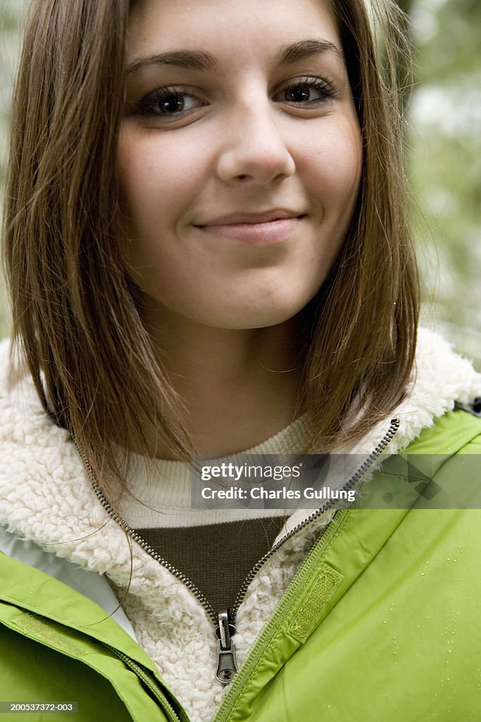 Teenage girl (14-16) smiling, portrait, close-up