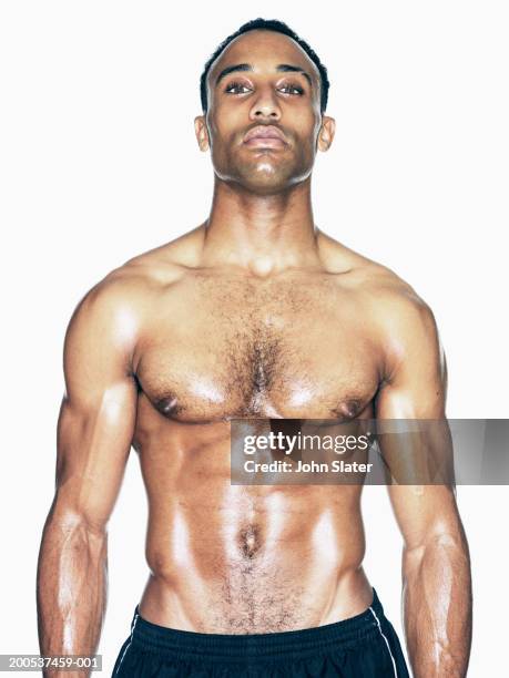 bare chested young man, portrait - pectoral muscle stock pictures, royalty-free photos & images