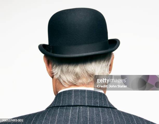 senior businessman wearing bowler hat, close-up, rear view - pinstripe stock pictures, royalty-free photos & images