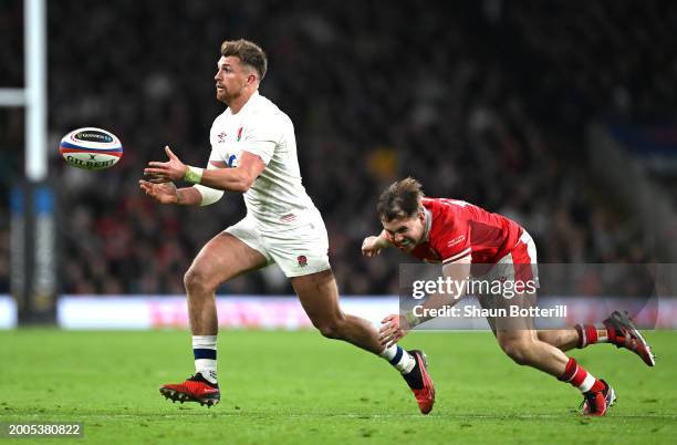 Henry Slade of England avoids a tackle from Ioan Lloyd of Wales during the Guinness Six Nations 2024 match between England and Wales at Twickenham...