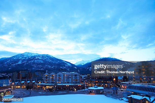 canada, british columbia, whistler village and mountains - whistler bc stock pictures, royalty-free photos & images