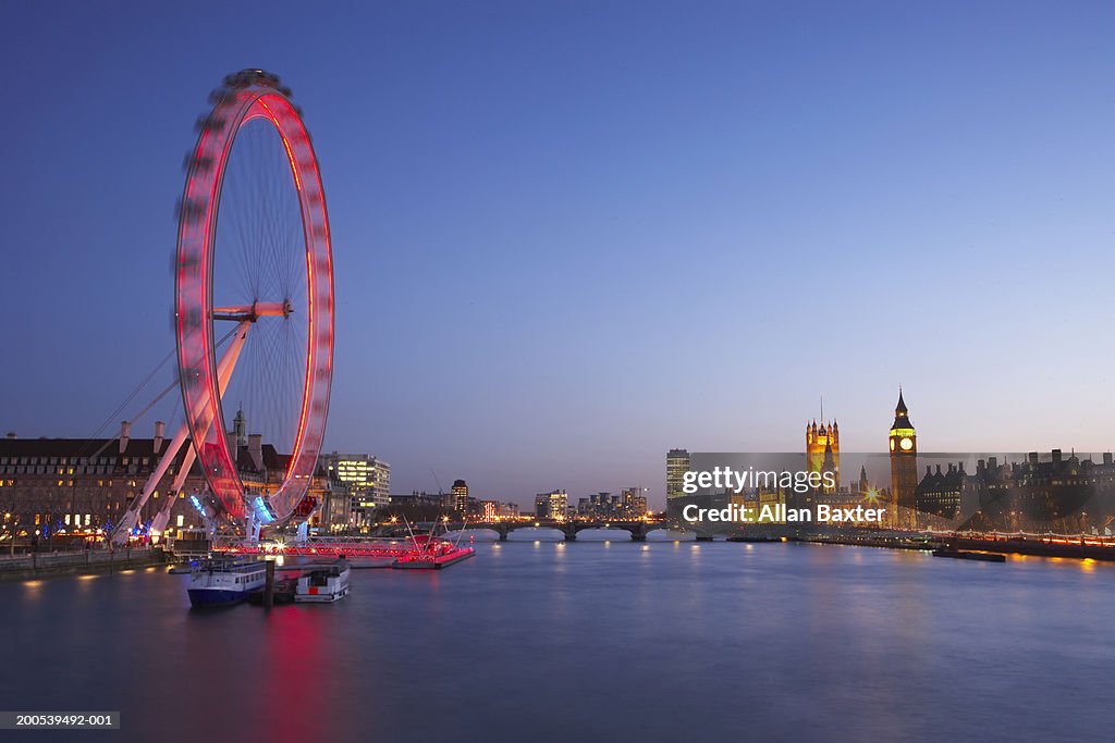 UK, London, River Thames, Millennium Wheel illuminated at dusk