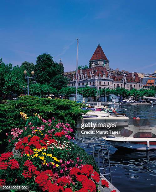 switzerland, lausanne, chateau d'ouchy, boats in lake geneva - lausanne stock pictures, royalty-free photos & images