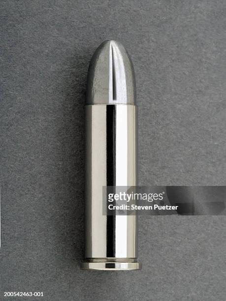 silver bullet (.38 caliber), close-up - silver metal stock pictures, royalty-free photos & images