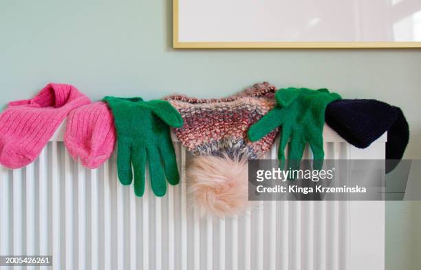 heating - multi coloured glove stock pictures, royalty-free photos & images