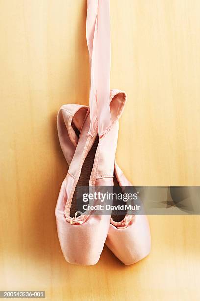 ballet shoes hanging on chair, close-up - pointe stock pictures, royalty-free photos & images