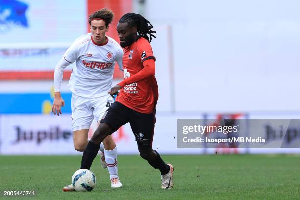 Milan Smits of Antwerp battles for the ball with Junior Marsoni Sambu Mansoni of RWDM during the Jupiler Pro League season 2023 - 2024 match day 25...