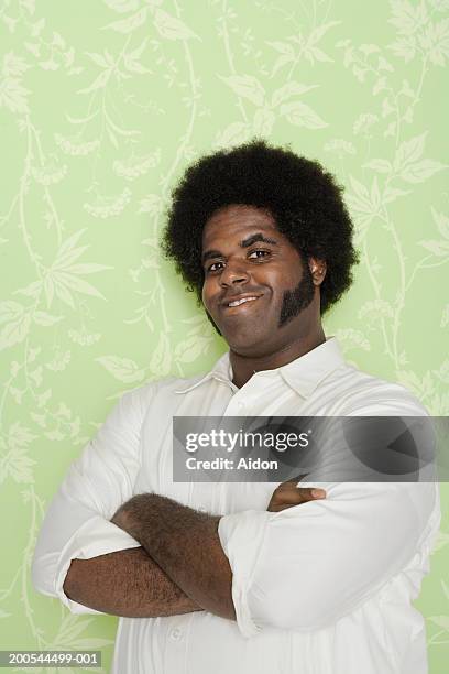 man with arms crossed, smiling, portrait - sideburn foto e immagini stock