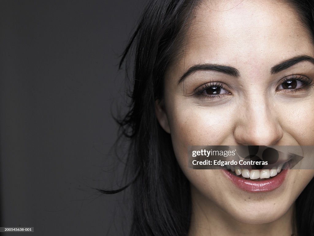 Young woman, smiling, portrait, close-up of face