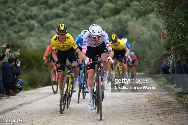 Sepp Kuss of The United States and Team Visma | Lease a Bike and Tim Wellens of Belgium and UAE Team Emirates compete during the 3rd Clasica Jaen...