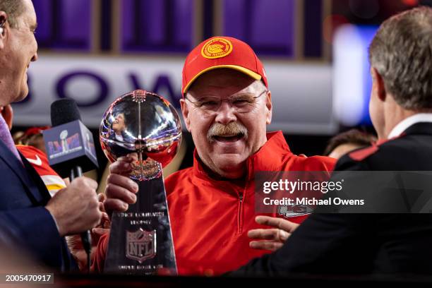 Head coach Andy Reid of the Kansas City Chiefs celebrates with the Vince Lombardi Trophy following the NFL Super Bowl 58 football game between the...