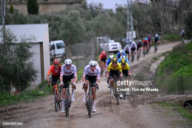Omar Fraile Matarranz of Spain and Team INEOS Grenadiers, Tim Wellens of Belgium and Juan Ayuso Pesquera of Spain and UAE Team Emirates compete...