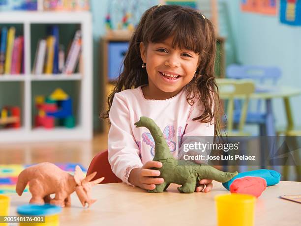 schoolgirl smiling (4-5) smiling, portrait - child's play clay stock pictures, royalty-free photos & images