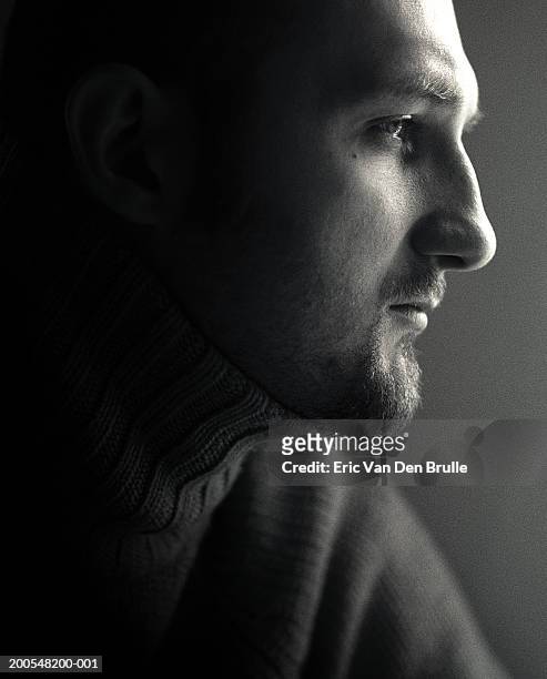 man looking away, close-up, side view - eric van den brulle stock pictures, royalty-free photos & images