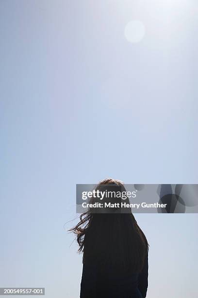 woman outdoors, rear view - woman silhouette bildbanksfoton och bilder