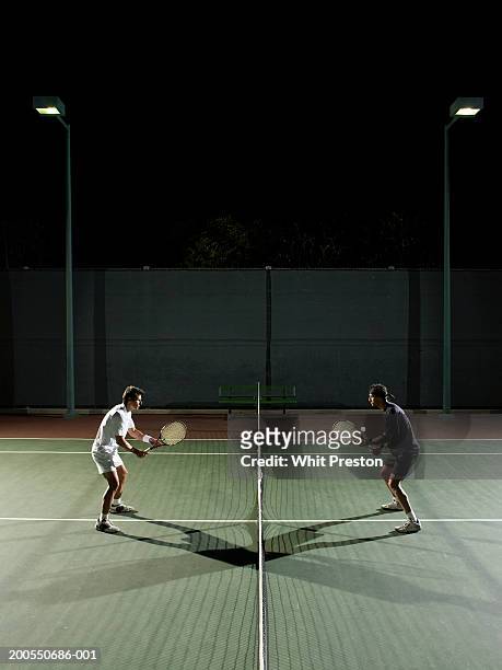 men playing tennis - symmetry imagens e fotografias de stock