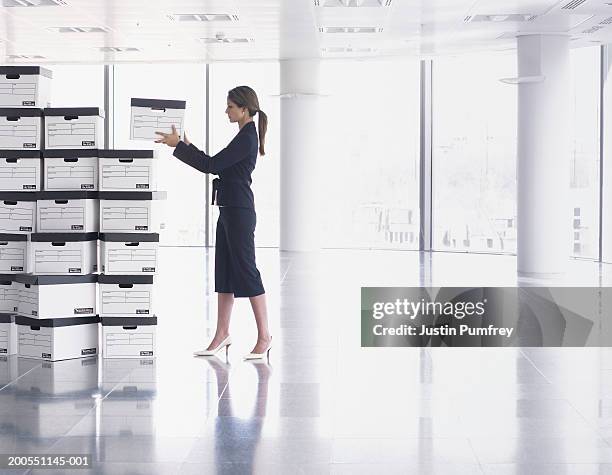 Stack Of Boxes In Office Photos and Premium High Res Pictures - Getty ...