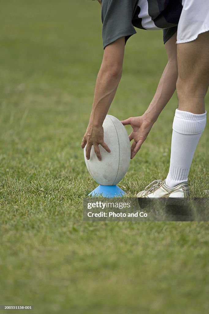 Laying Rugby Player Placing Rugby Ball On Kicking Tee Low Section High-Res Stock ...