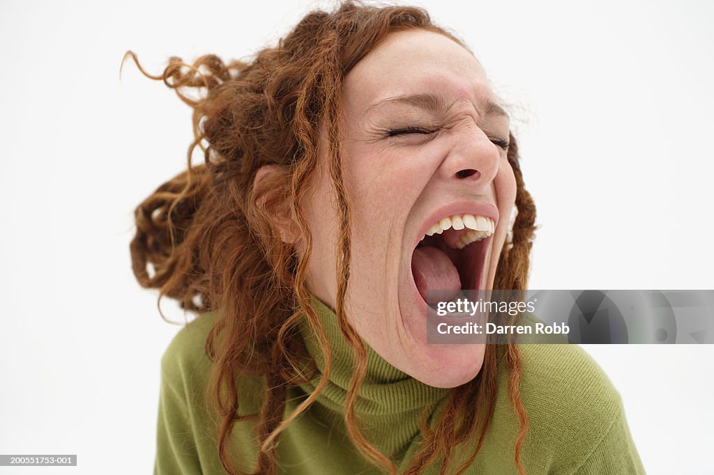 Young woman shouting, close-up