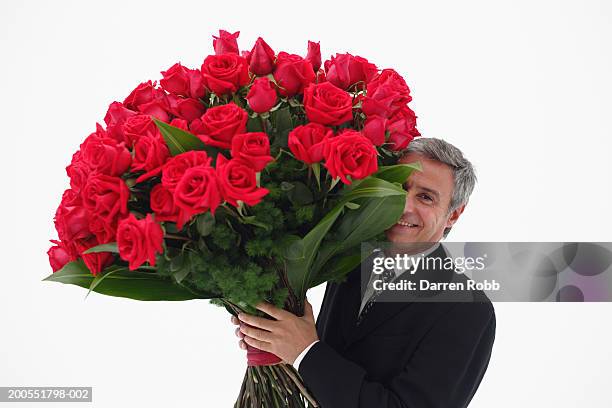 Man Carrying Roses 5,082 Man Holding Roses Stock Photos, High-Res Pictures, and Images ...