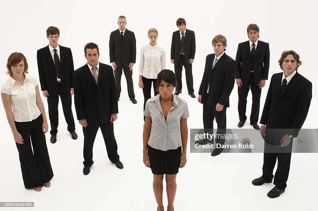 Group of young businesspeople standing together, portrait, elevated view