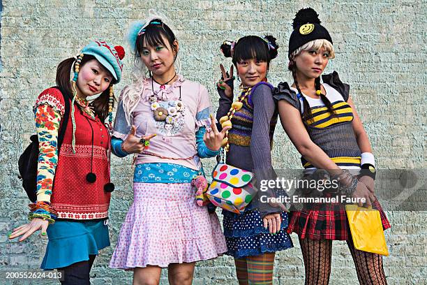 four women standing on sidewalk, portrait - harajuku stock pictures, royalty-free photos & images