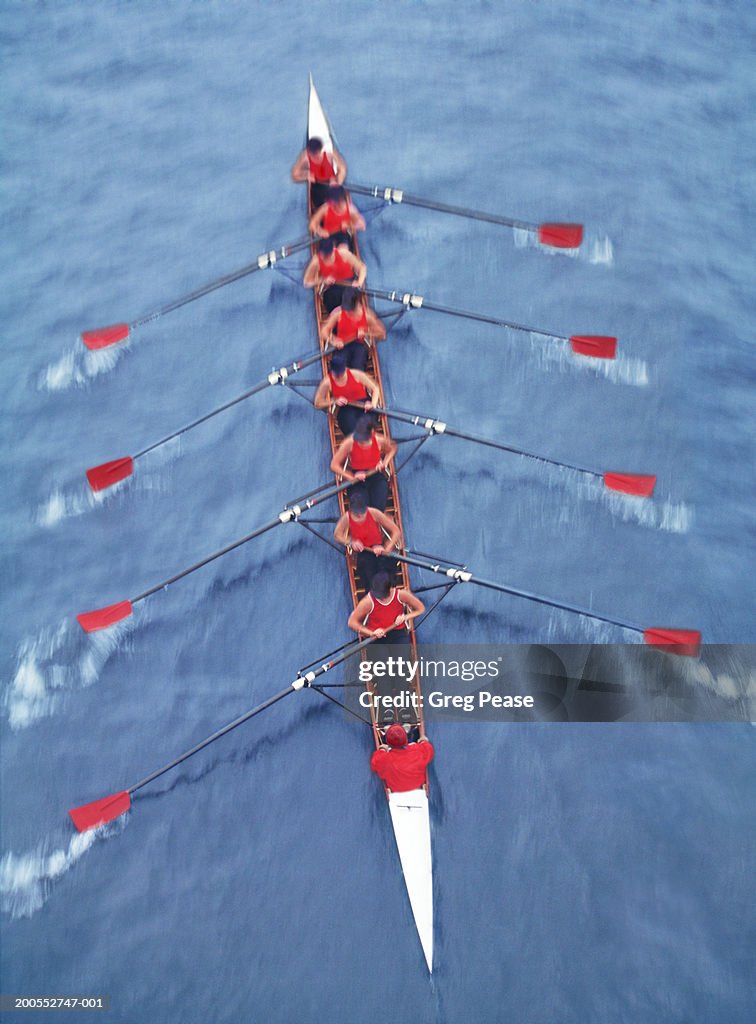 Rowers in eight person-scull, elevated view (blurred motion)