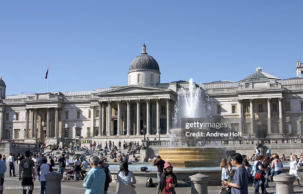 England, London, Trafalgar Square, tourists in front of National Gallery