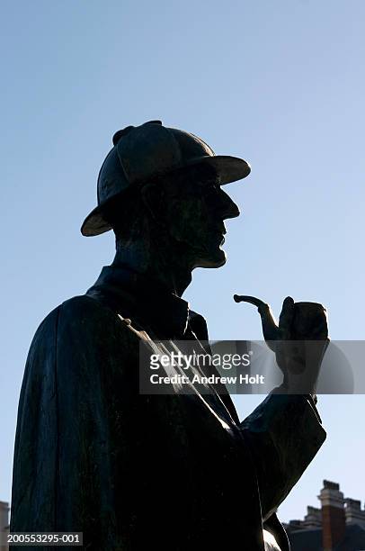 silhouette of sherlock holmes statue, close-up - sherlock holmes stock pictures, royalty-free photos & images