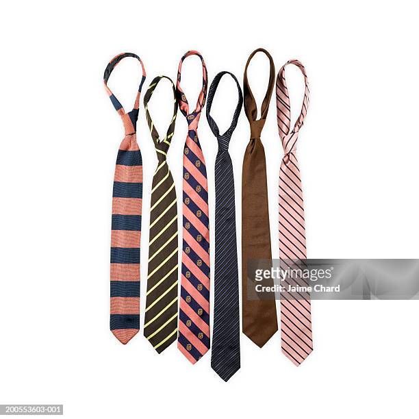 selection of ties on white background, front view. - das stockfoto's en -beelden
