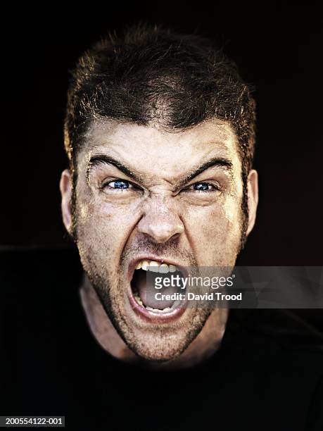 man screaming, close-up, portrait - screaming stock pictures, royalty-free photos & images
