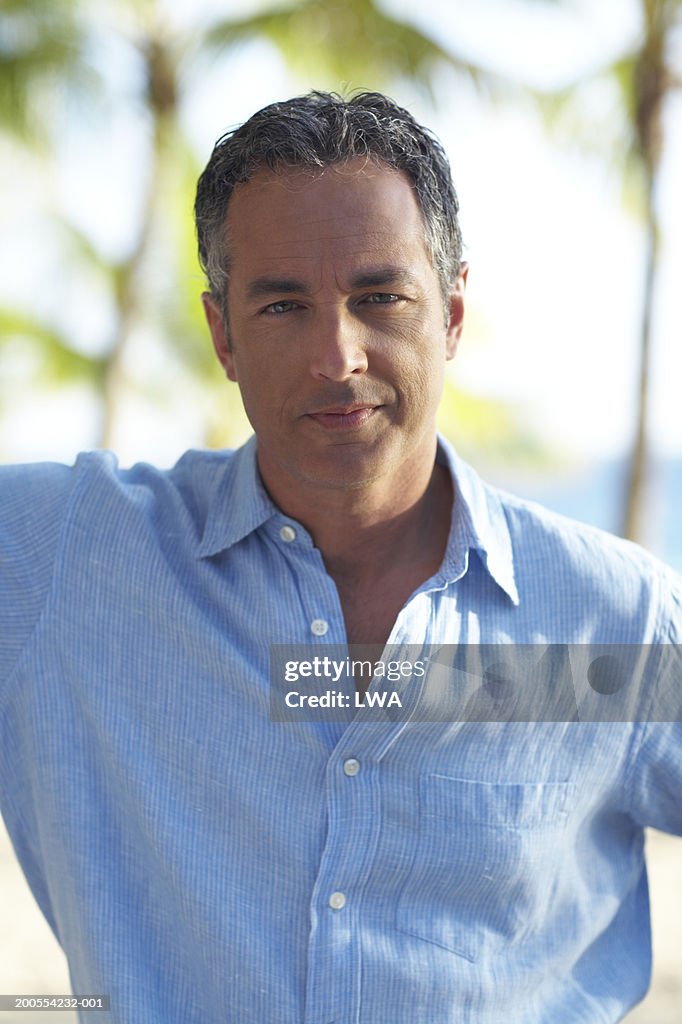 Mature man smiling, close-up, portrait