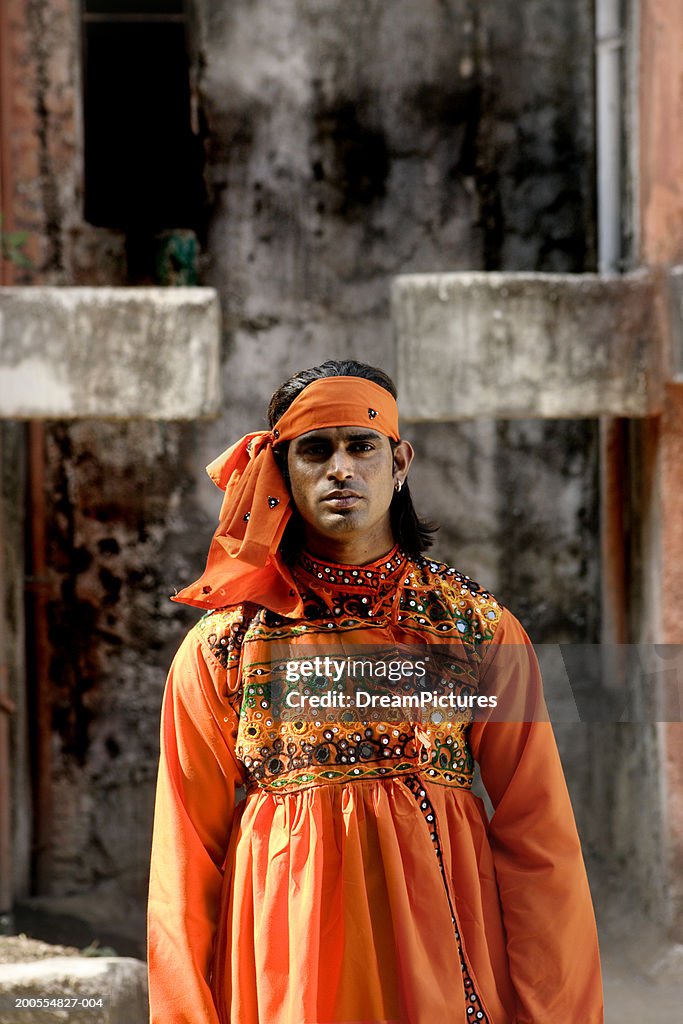 Bollywood actor in traditional costume, upper half, portrait