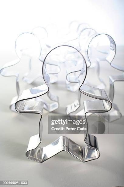 pastry cutters in two rows, one in front, close-up - pastry cutter stock pictures, royalty-free photos & images