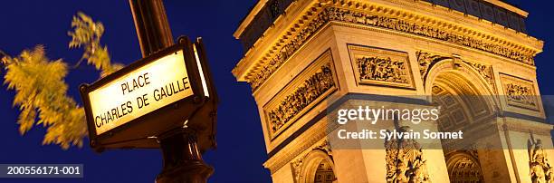 france, paris, arc de triomphe at night - place charles de gaulle stock pictures, royalty-free photos & images