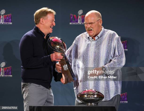 Commissioner Roger Goodell hands the Vince Lombardi Trophy to head coach Andy Reid of the Kansas City Chiefs during a news conference for the winning...
