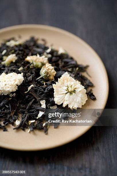 white tea on plate - white tea stock pictures, royalty-free photos & images