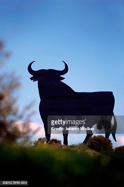 advertising hoarding in shape of bull, madrid, spain - bull billboard spain stock pictures, royalty-free photos & images