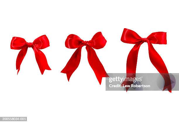 three red bows - bow fotografías e imágenes de stock