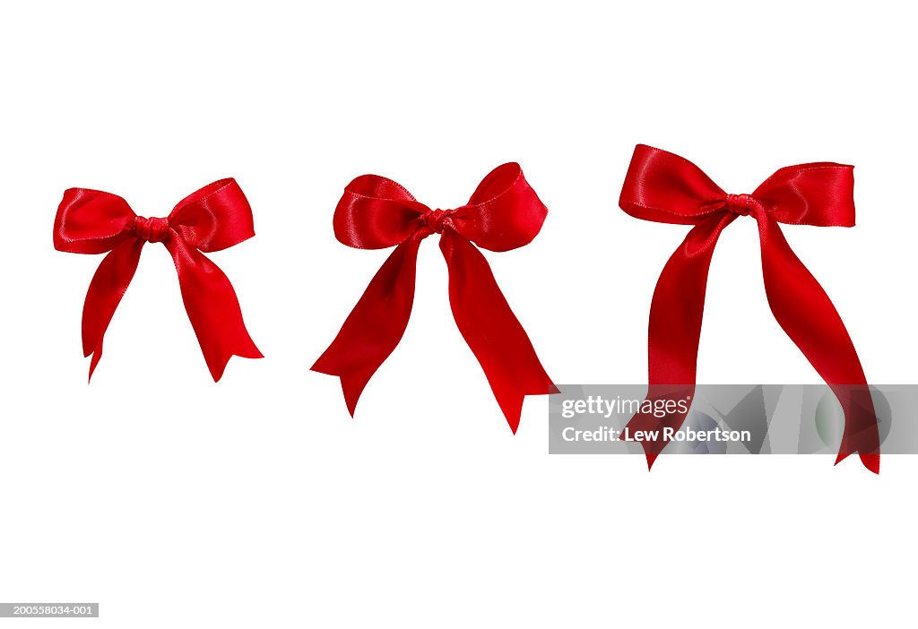 Three Red Bows High-Res Stock Photo - Getty Images