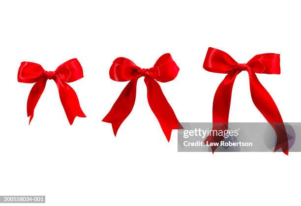 three red bows - tied bow stock pictures, royalty-free photos & images